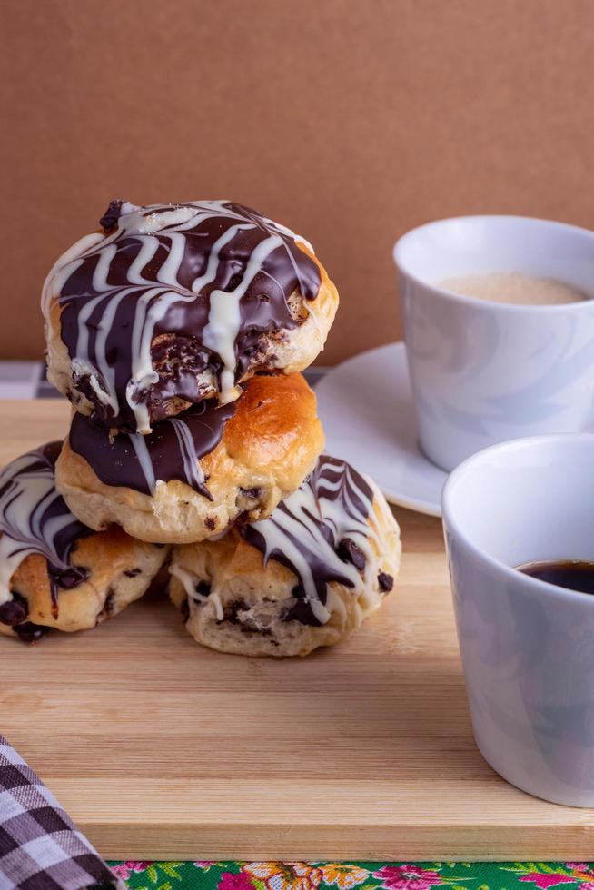 cup of coffee with brioche bread photo