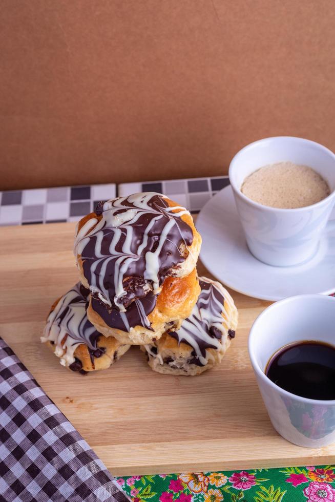 cup of coffee with brioche bread photo