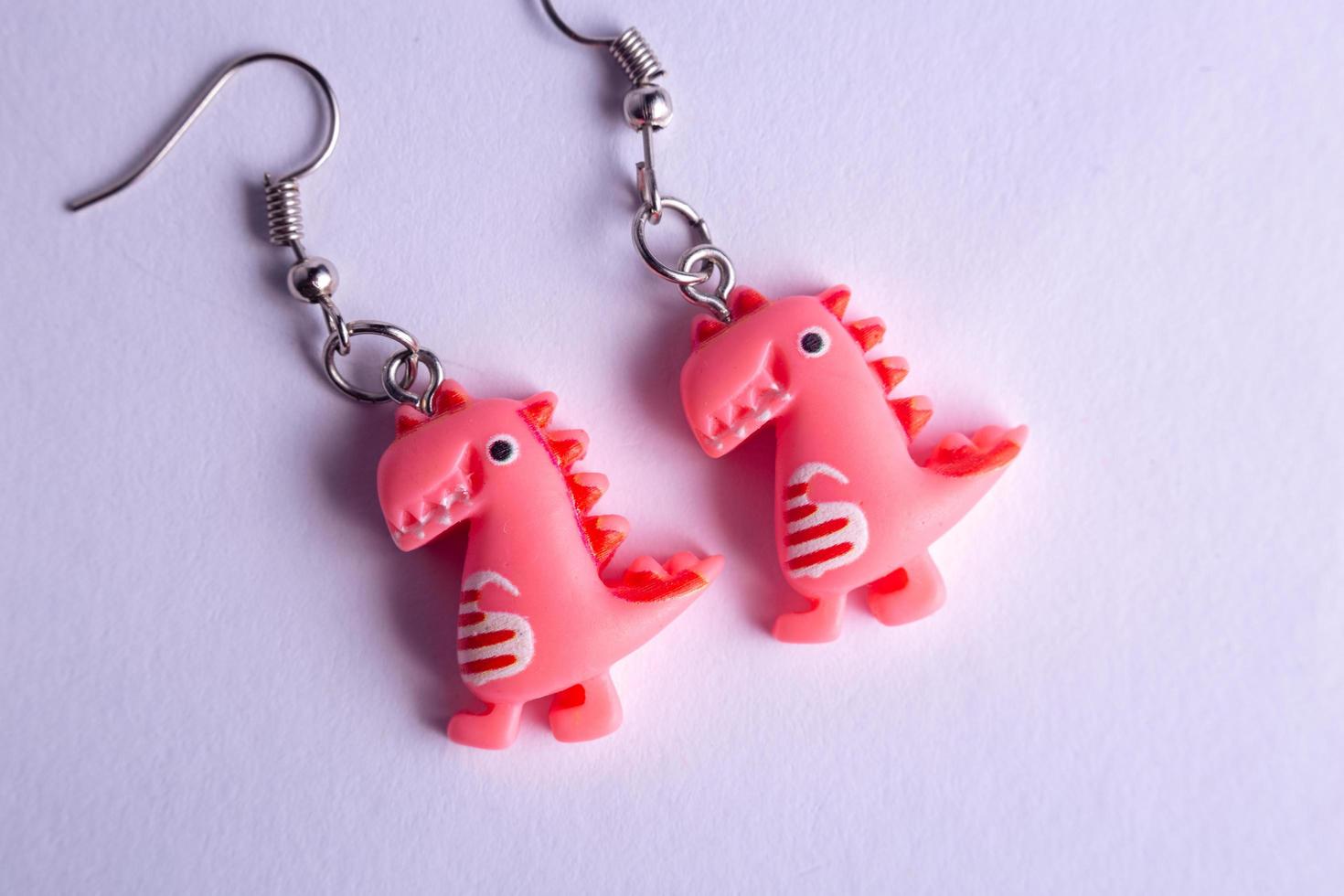 pink dinosaur earrings photo