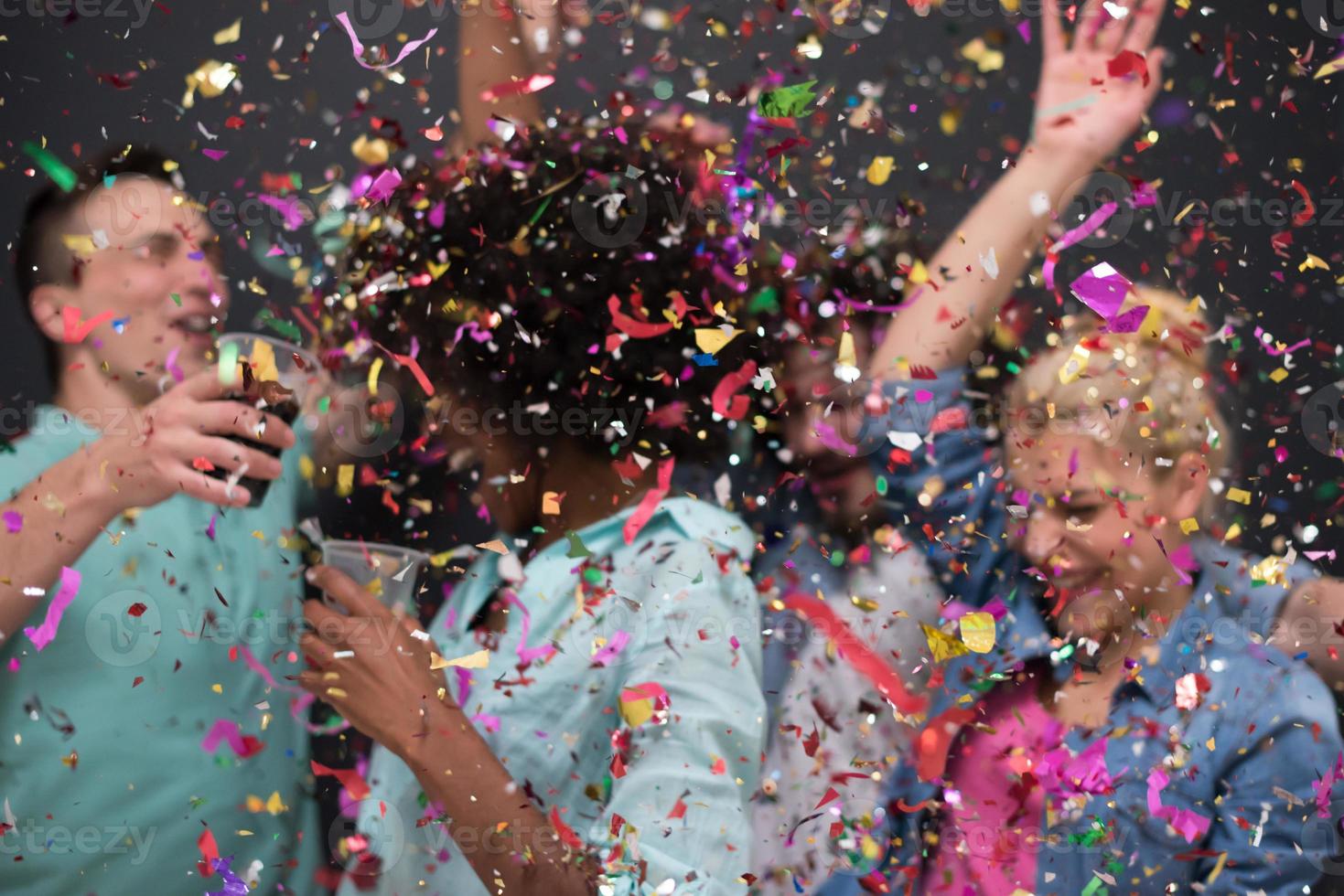 confetti party multiethnic group of people photo