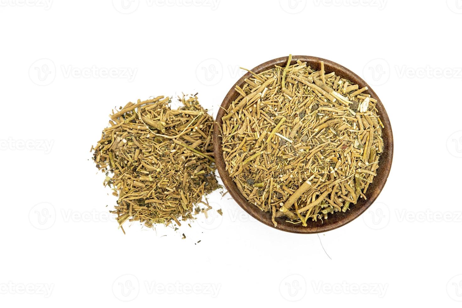 Ashwagandha or Aswaganda OR Indian Ginseng is an Ayurveda medicine Isolated on plain background photo