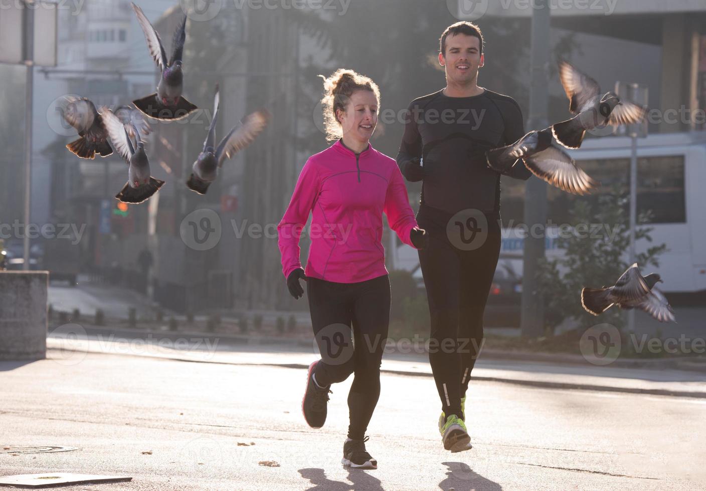 young  couple jogging photo