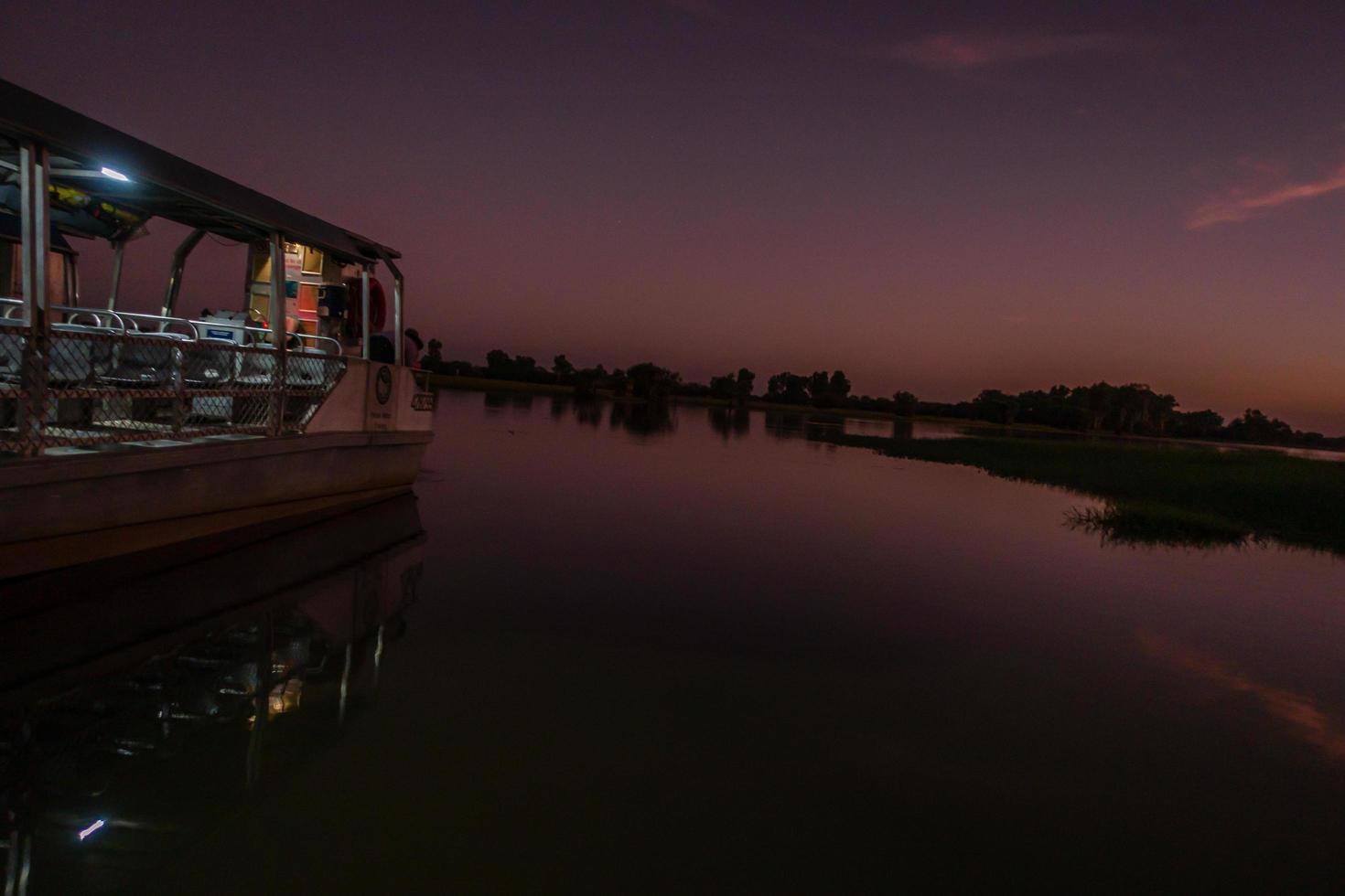 Tour boat at dawn photo