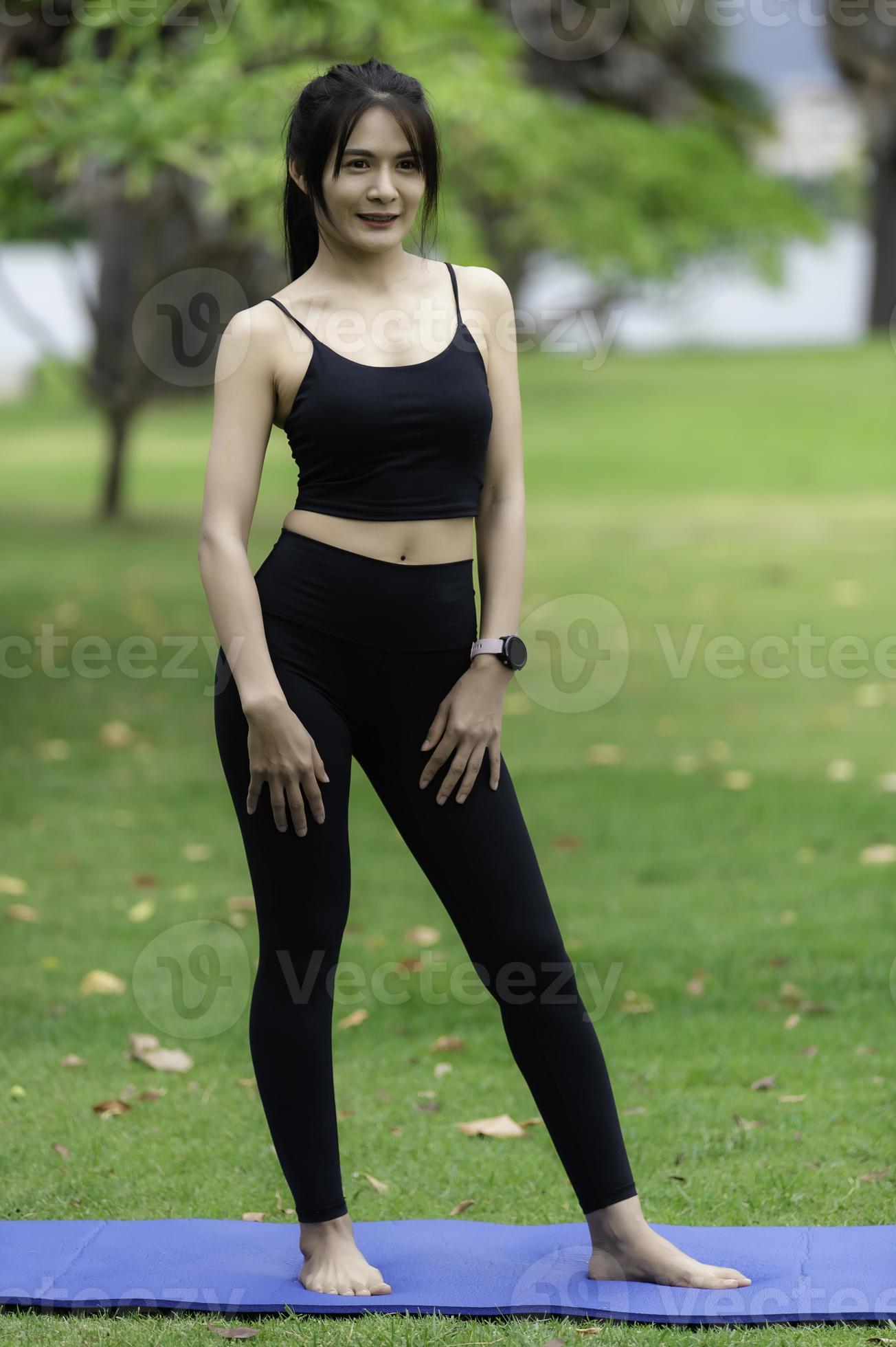 Portrait of young asian woman play yoga in the public park 10979979 Stock  Photo at Vecteezy