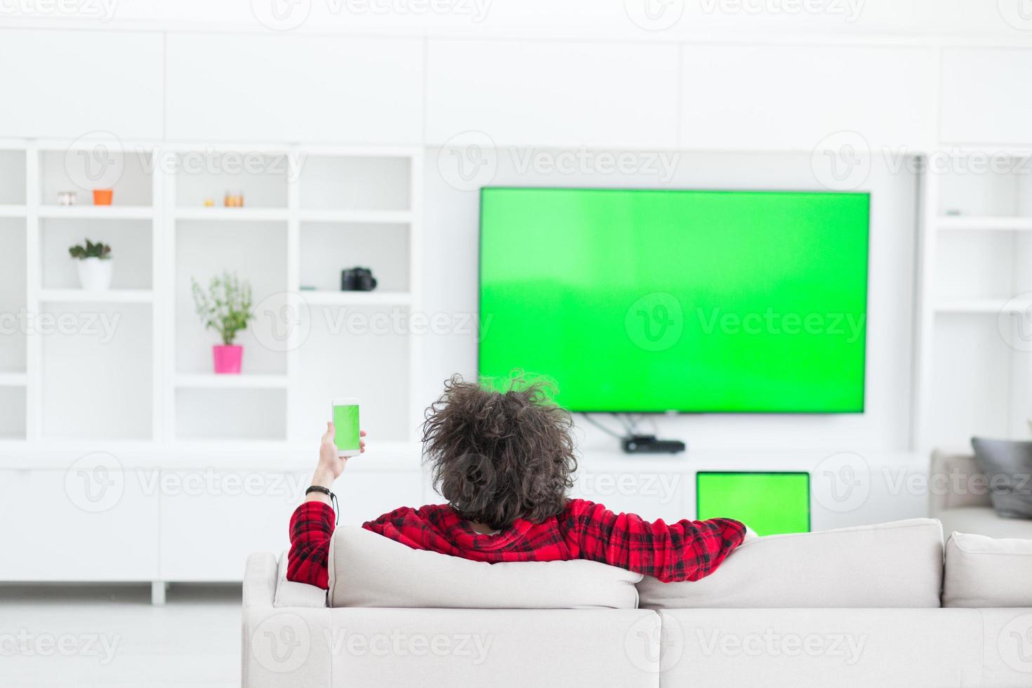 young man in bathrobe enjoying free time photo