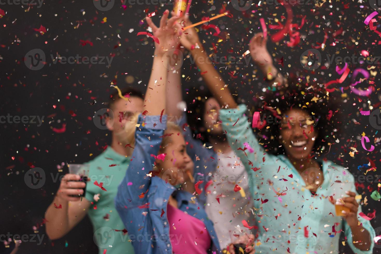 confetti party multiethnic group of people photo