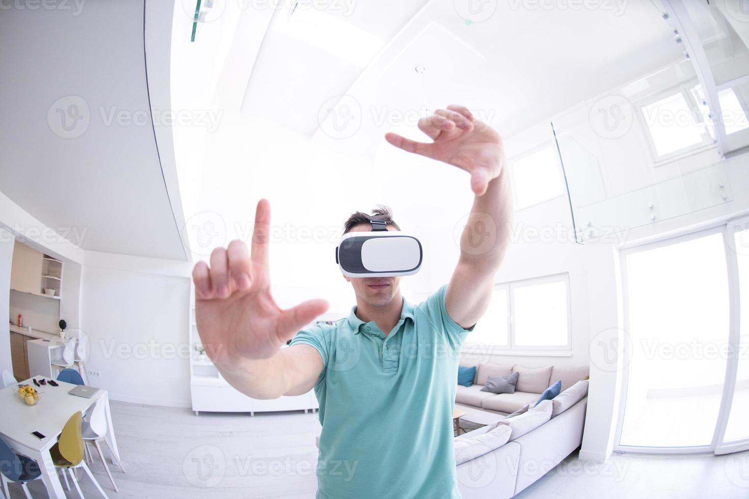 man using VR-headset glasses of virtual reality photo