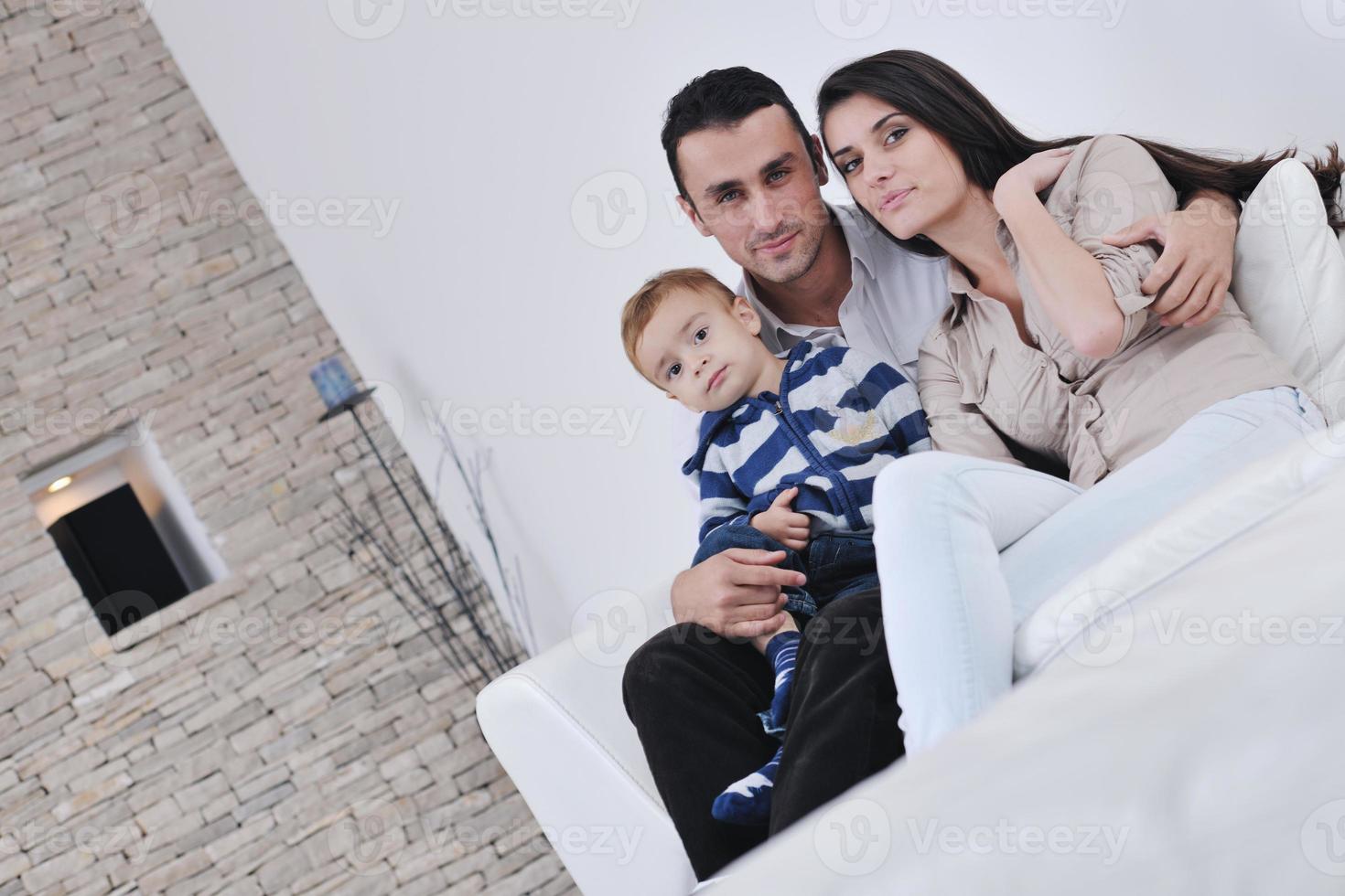 happy young family have fun  at home photo