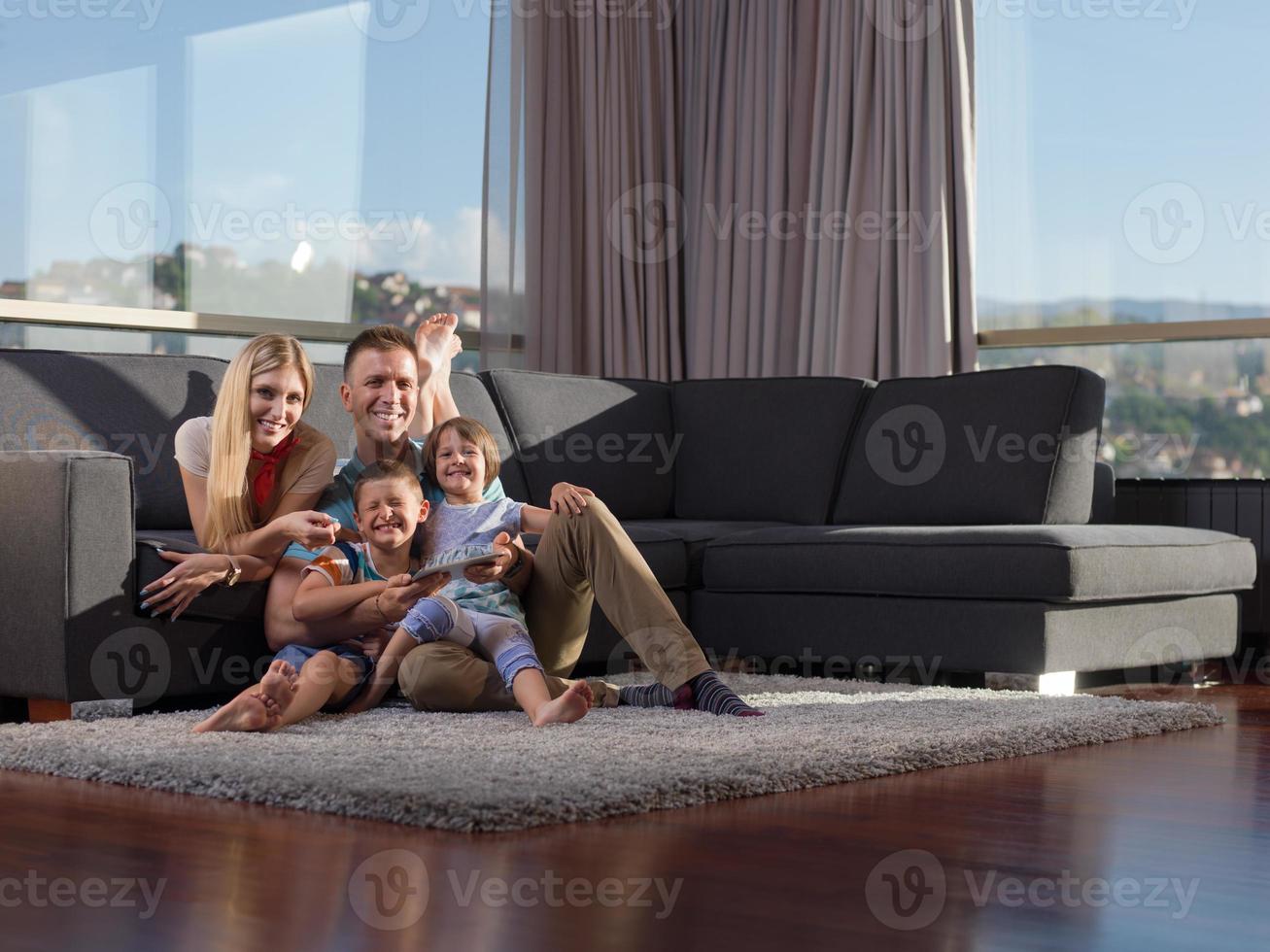 Family in livingroom photo