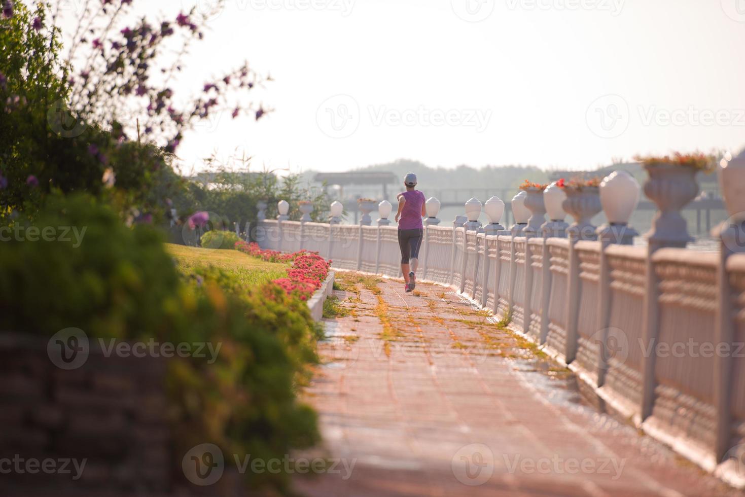 sporty woman jogging photo