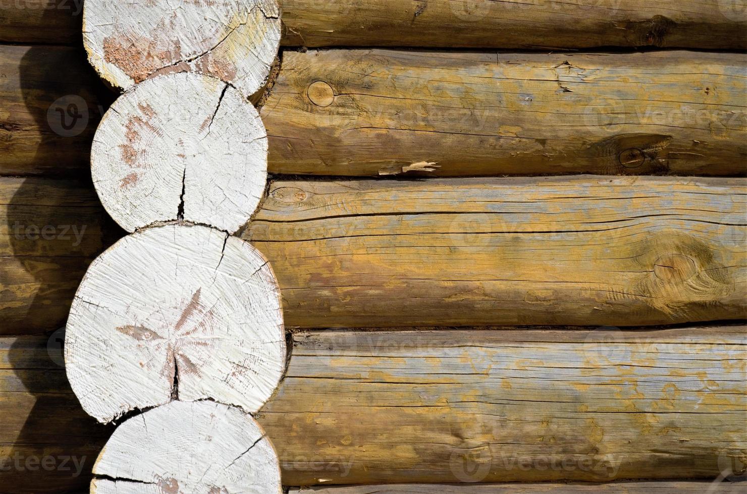 Corner of a house from a bar, logs close-up. Log house or barn. photo