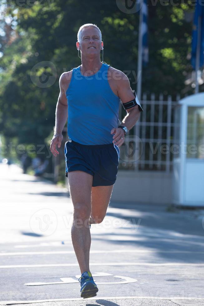 handsome senior man  jogging photo