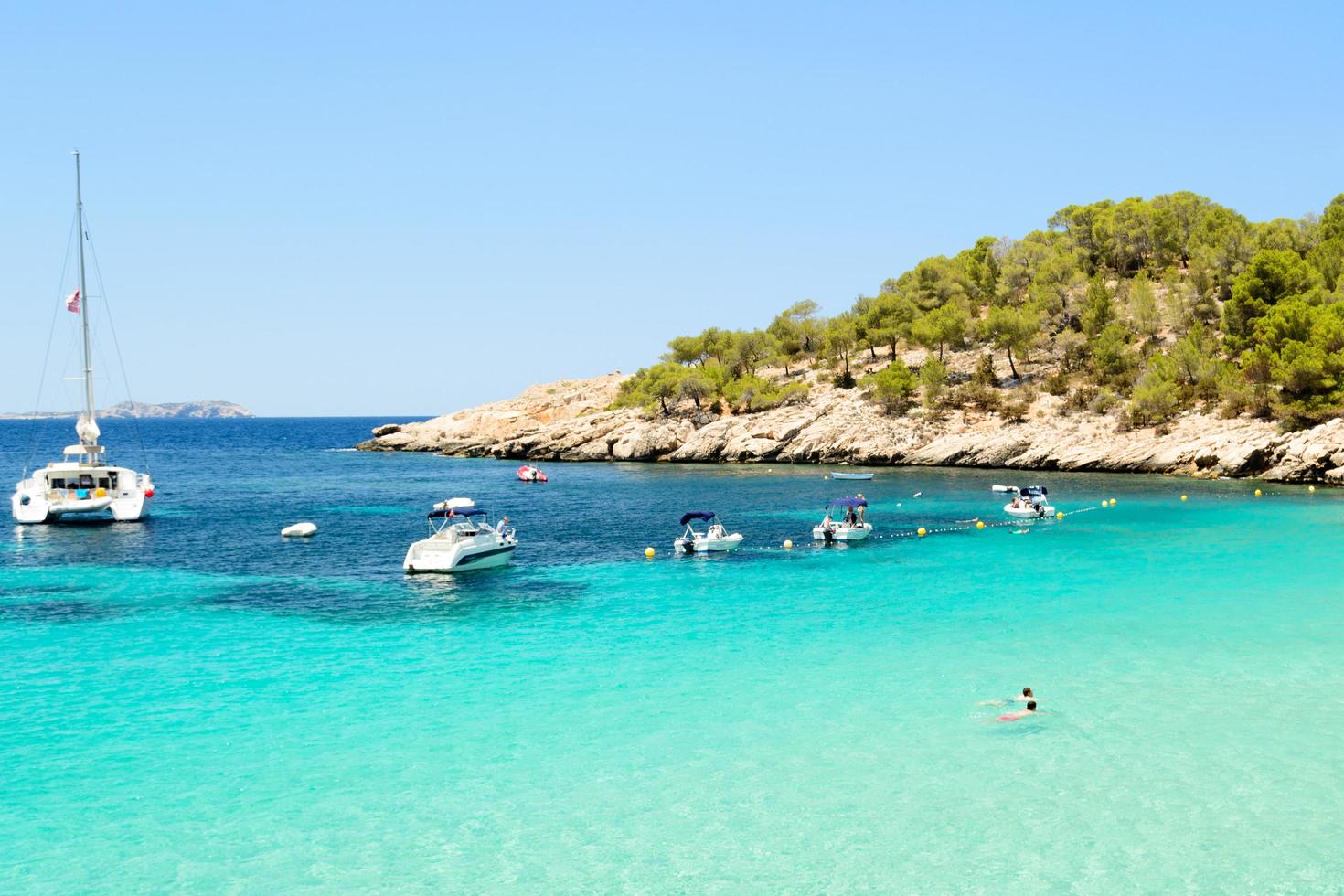 beach afternoon in Cala Salada, Sant Antoni de Portmany Ibiza, Spain photo