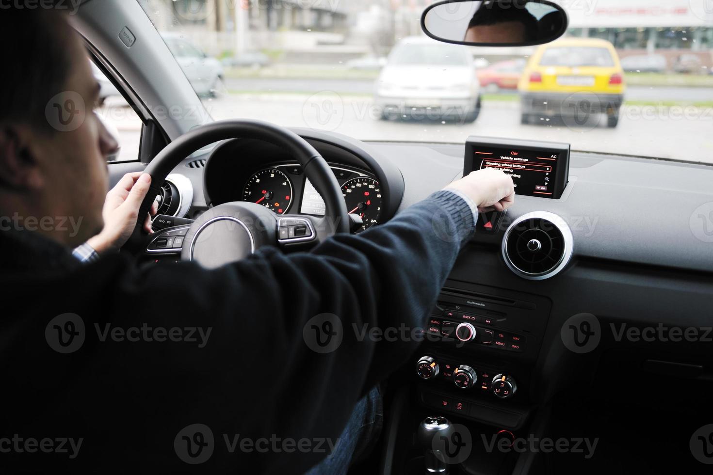 man using car navigation photo