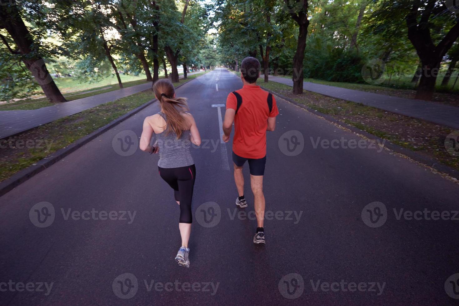 couple jogging outside photo