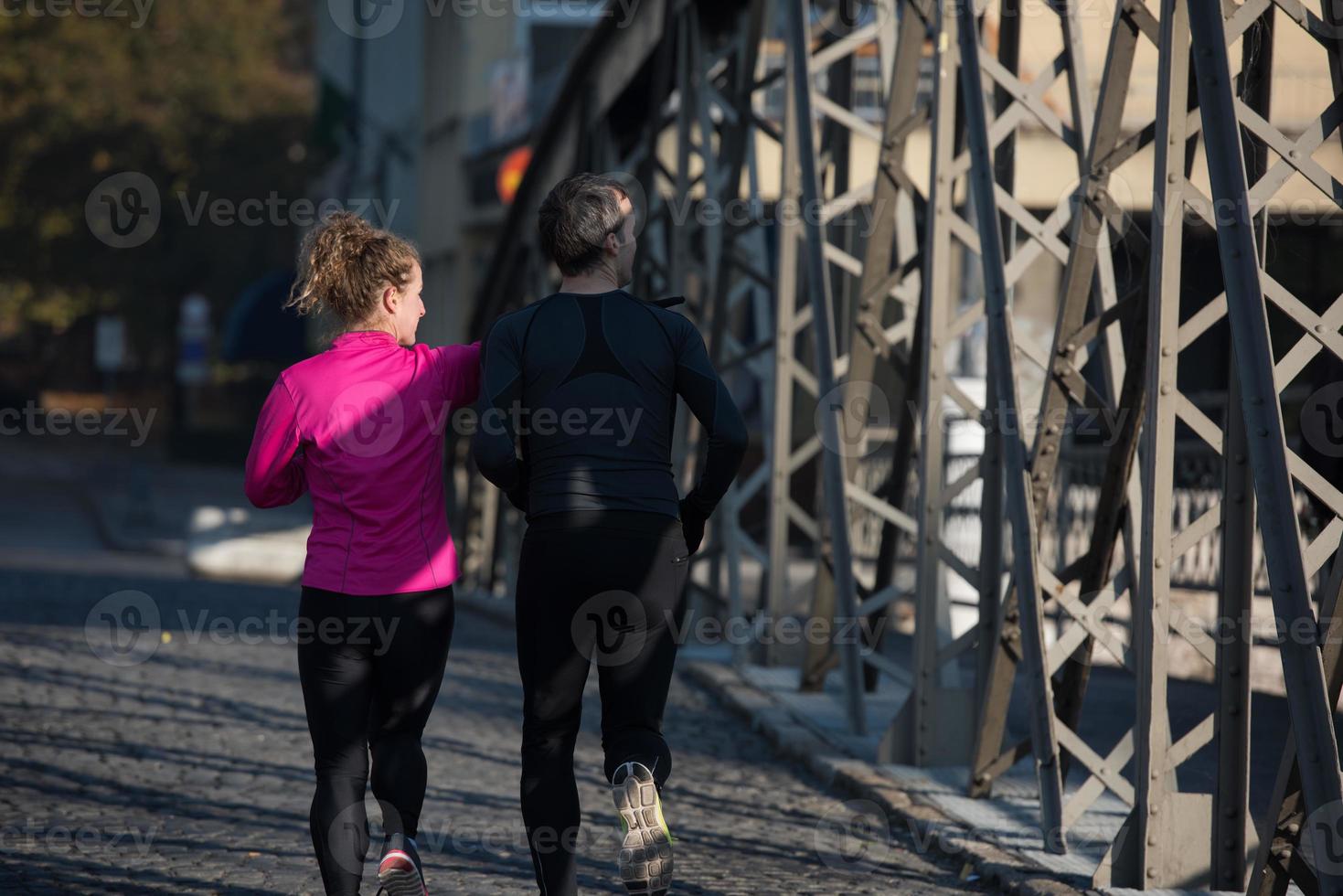 young  couple jogging photo