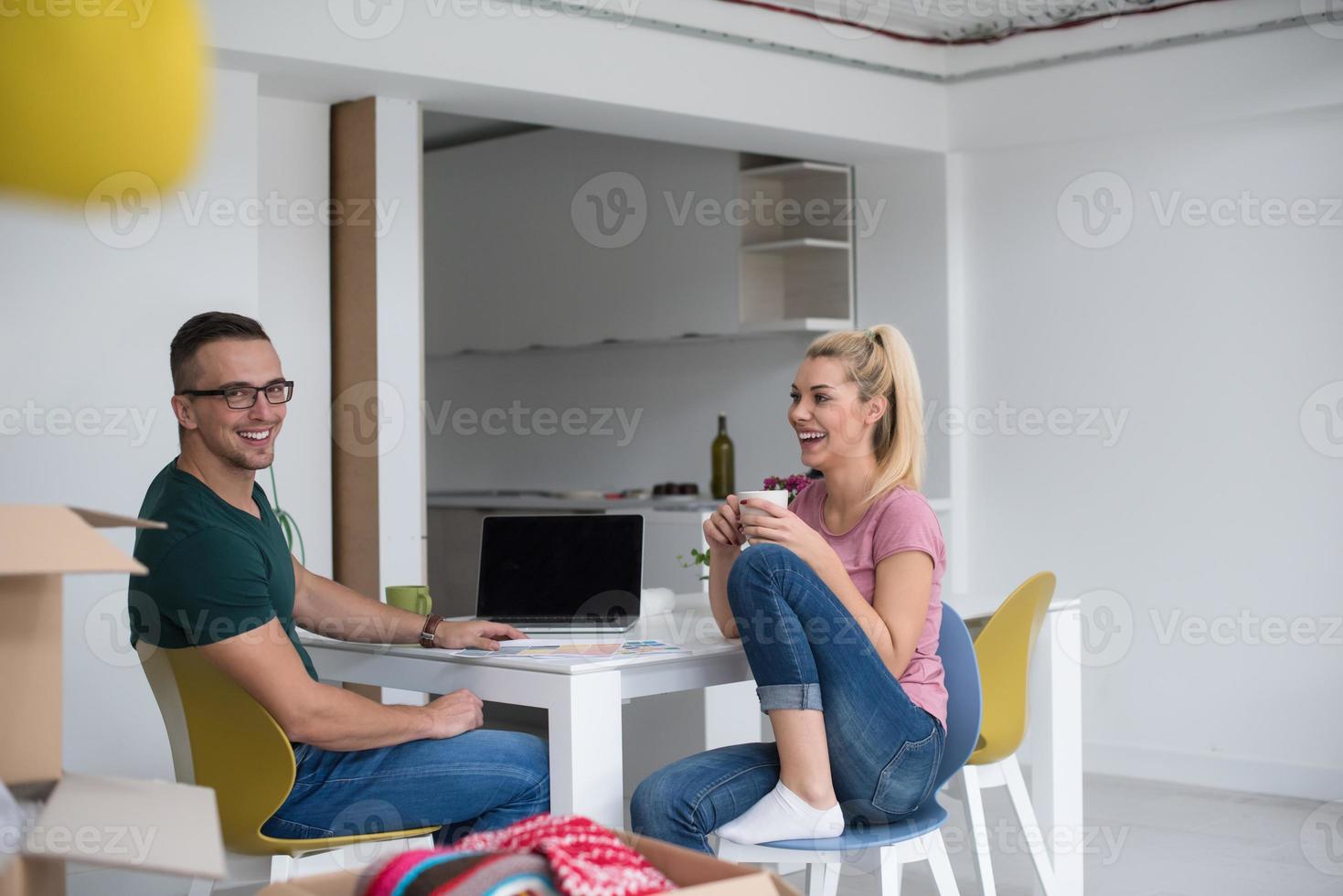 Young couple moving in a new home photo