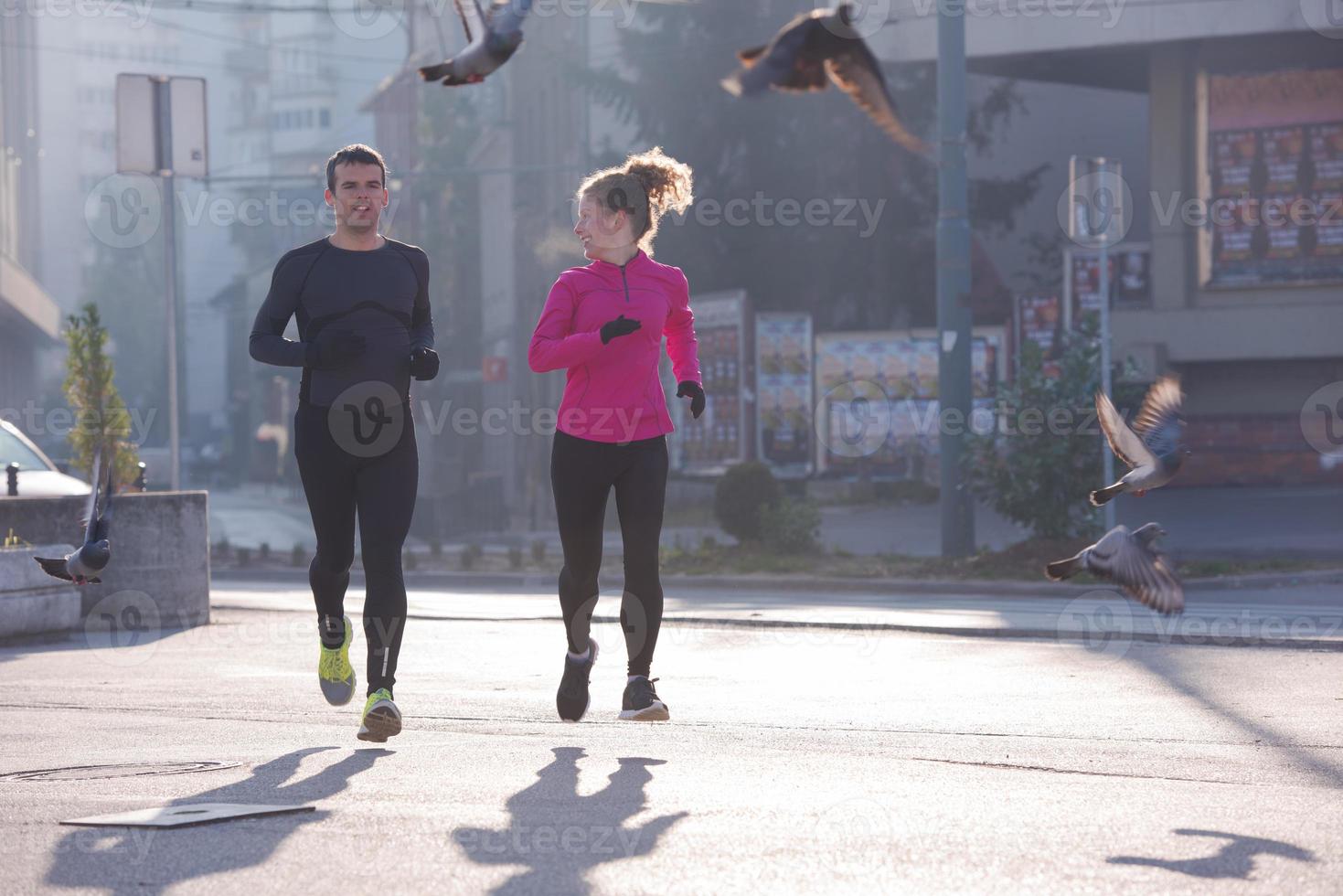 young  couple jogging photo