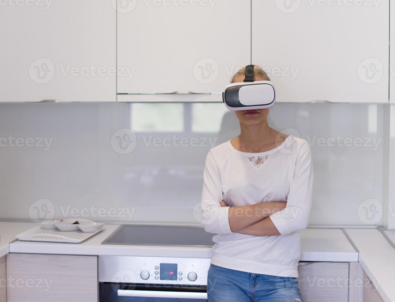 woman using VR-headset glasses of virtual reality photo