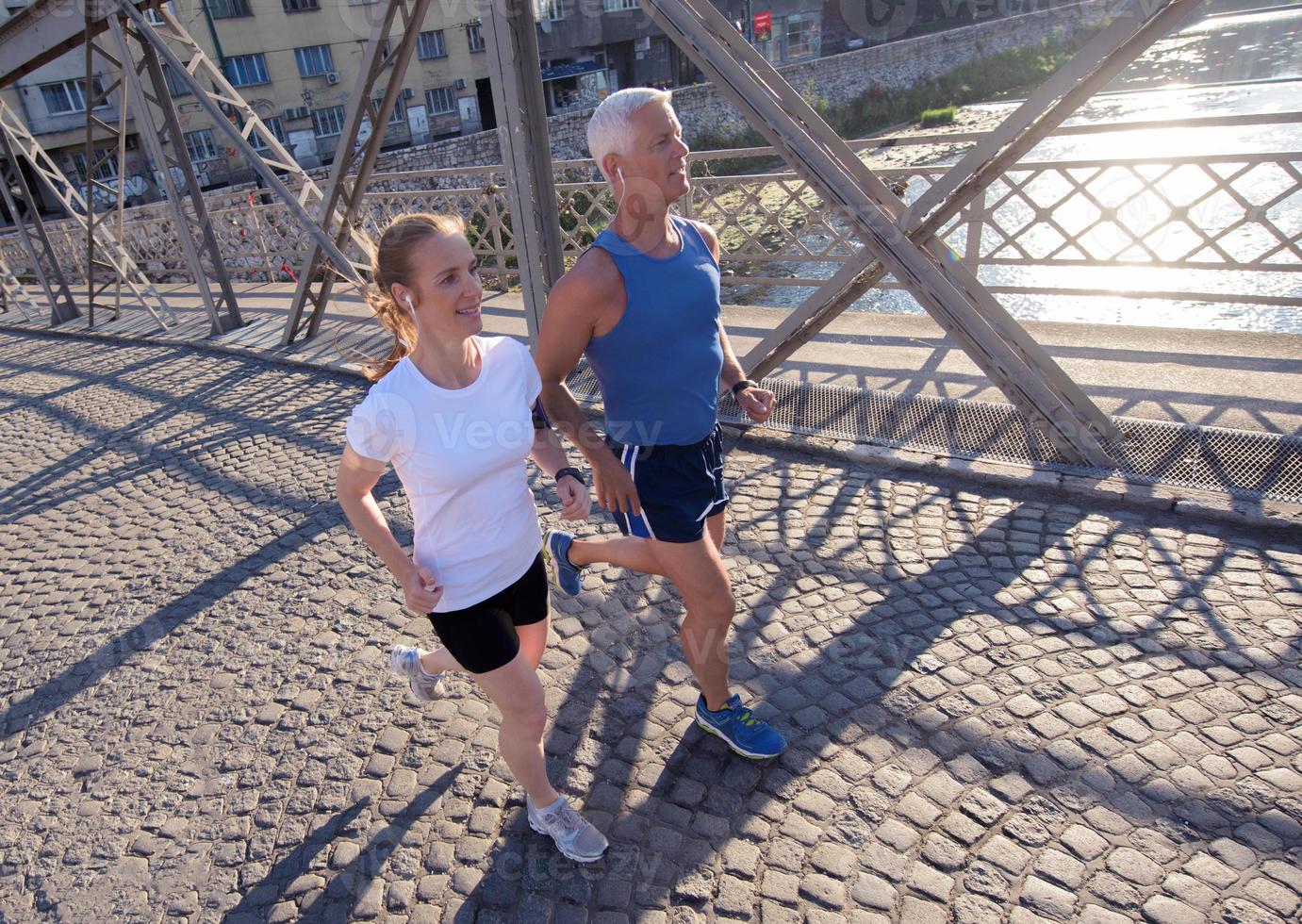 Couple jogging outside photo