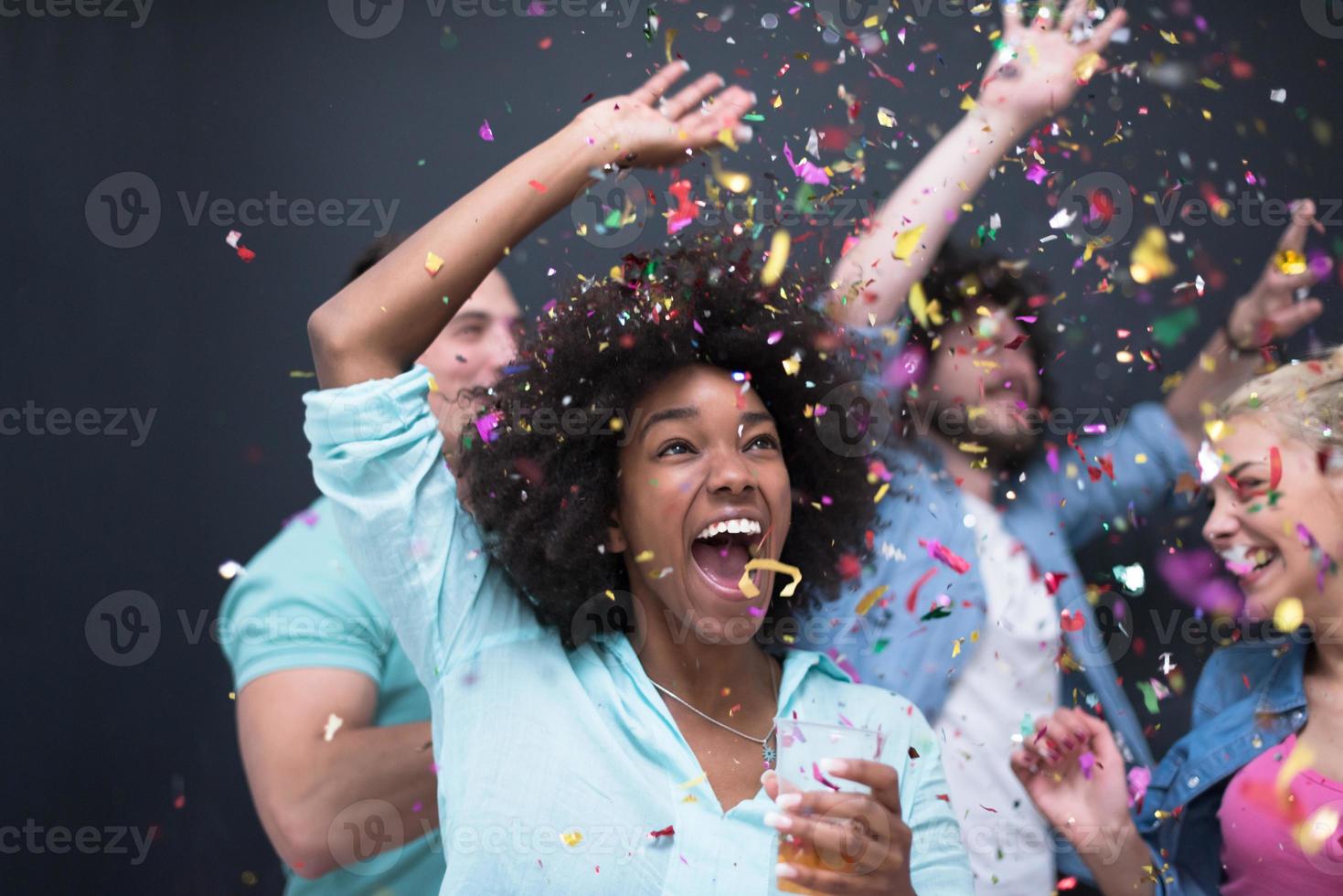 confetti party multiethnic group of people photo