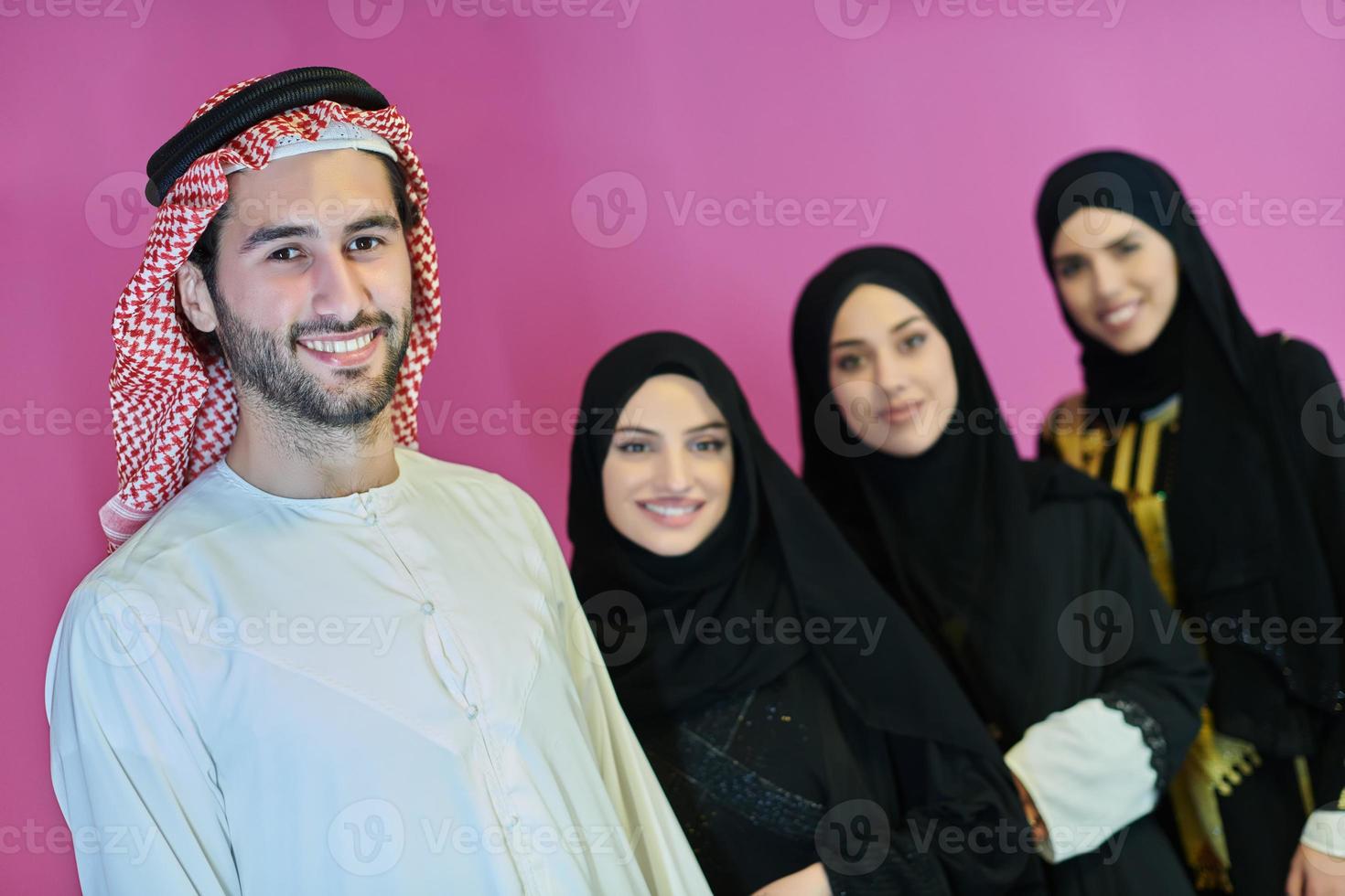 Portrait of young muslim people in traditional clothes photo