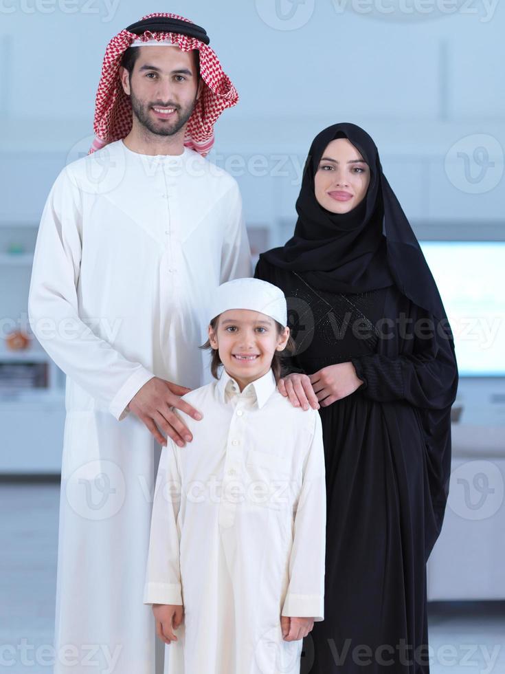 portrait of young happy arabian muslim family photo