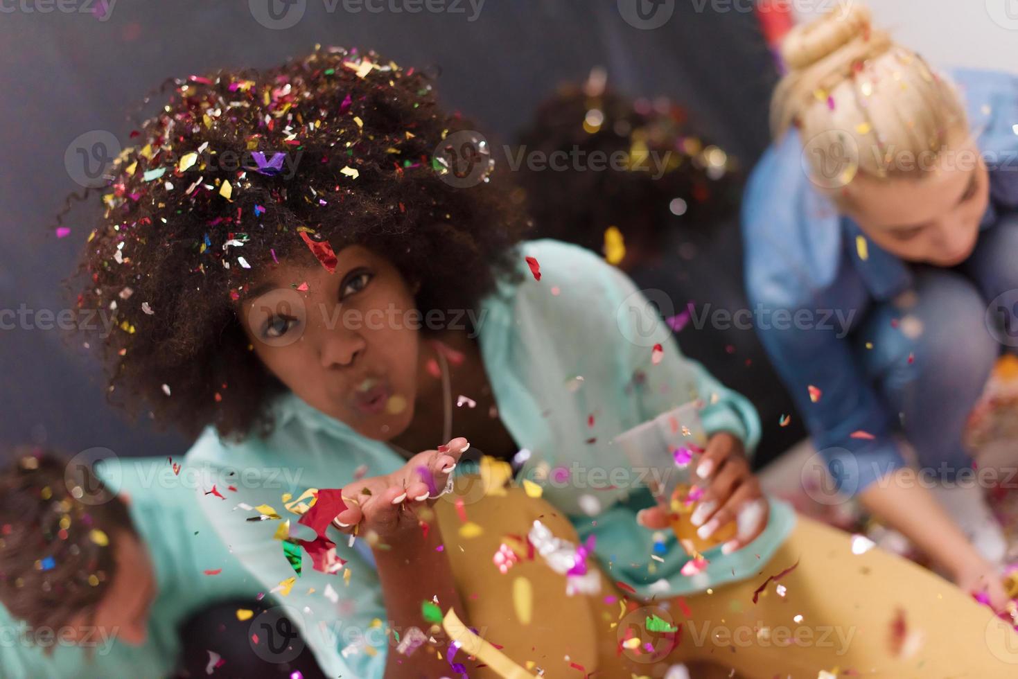 confetti party multiethnic group of people photo