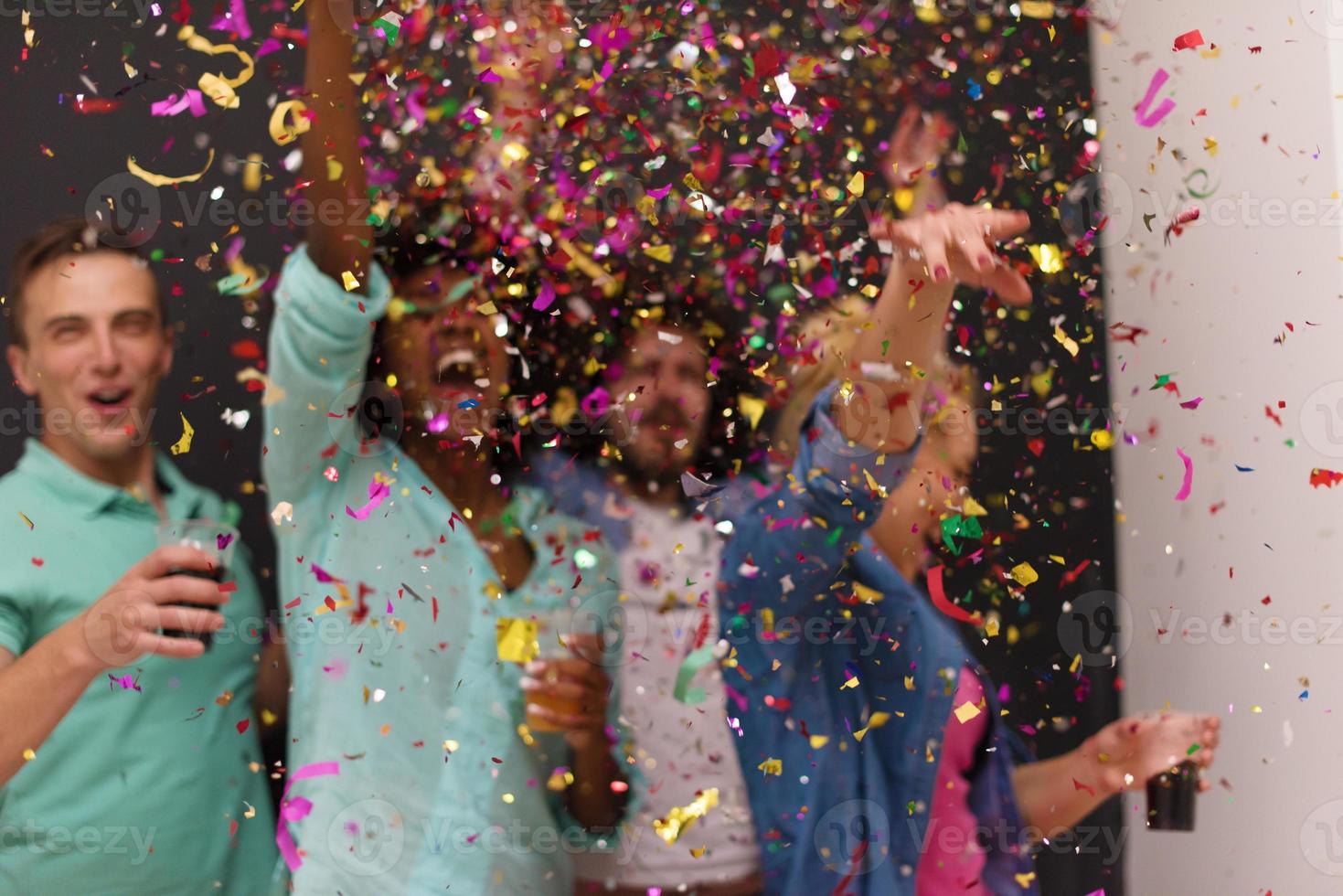 confetti party multiethnic group of people photo