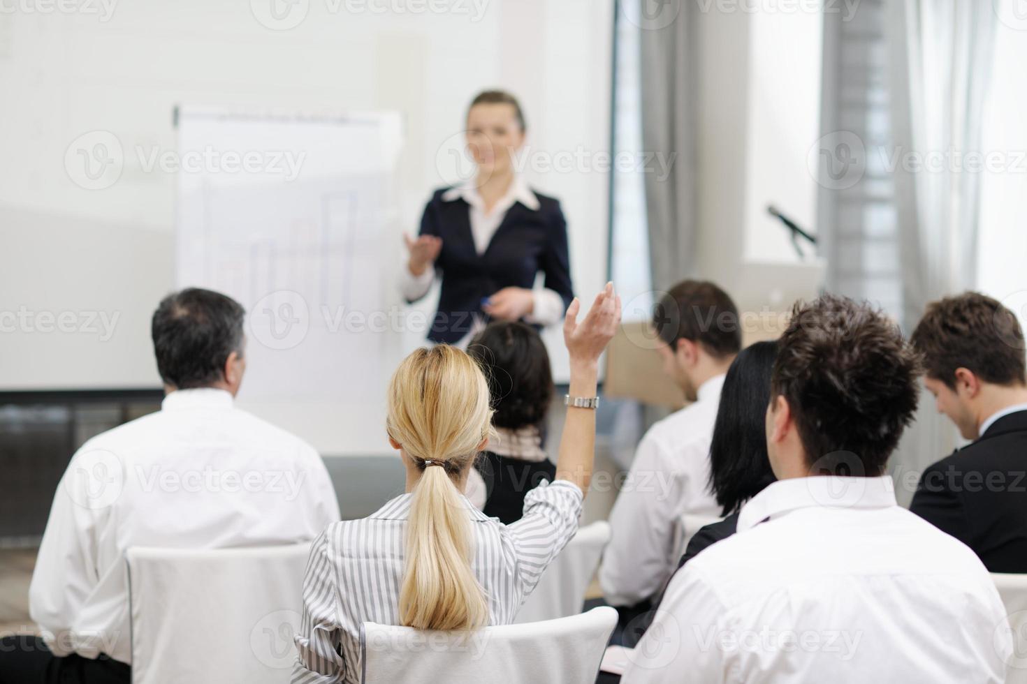 business woman giving presentation photo