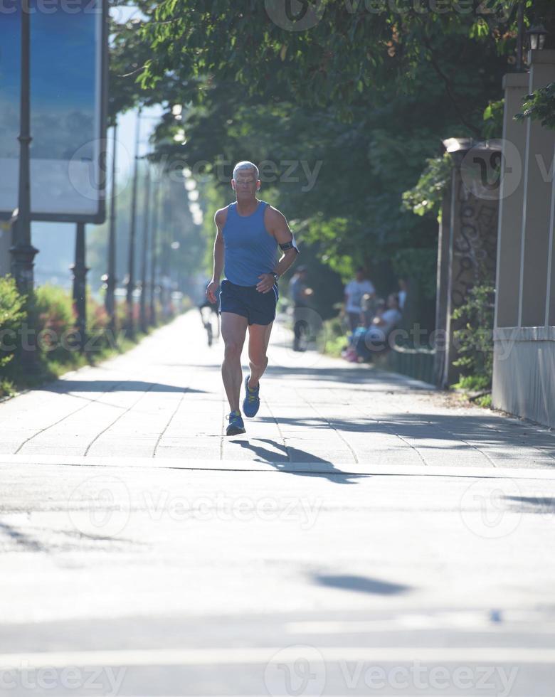 handsome senior man  jogging photo