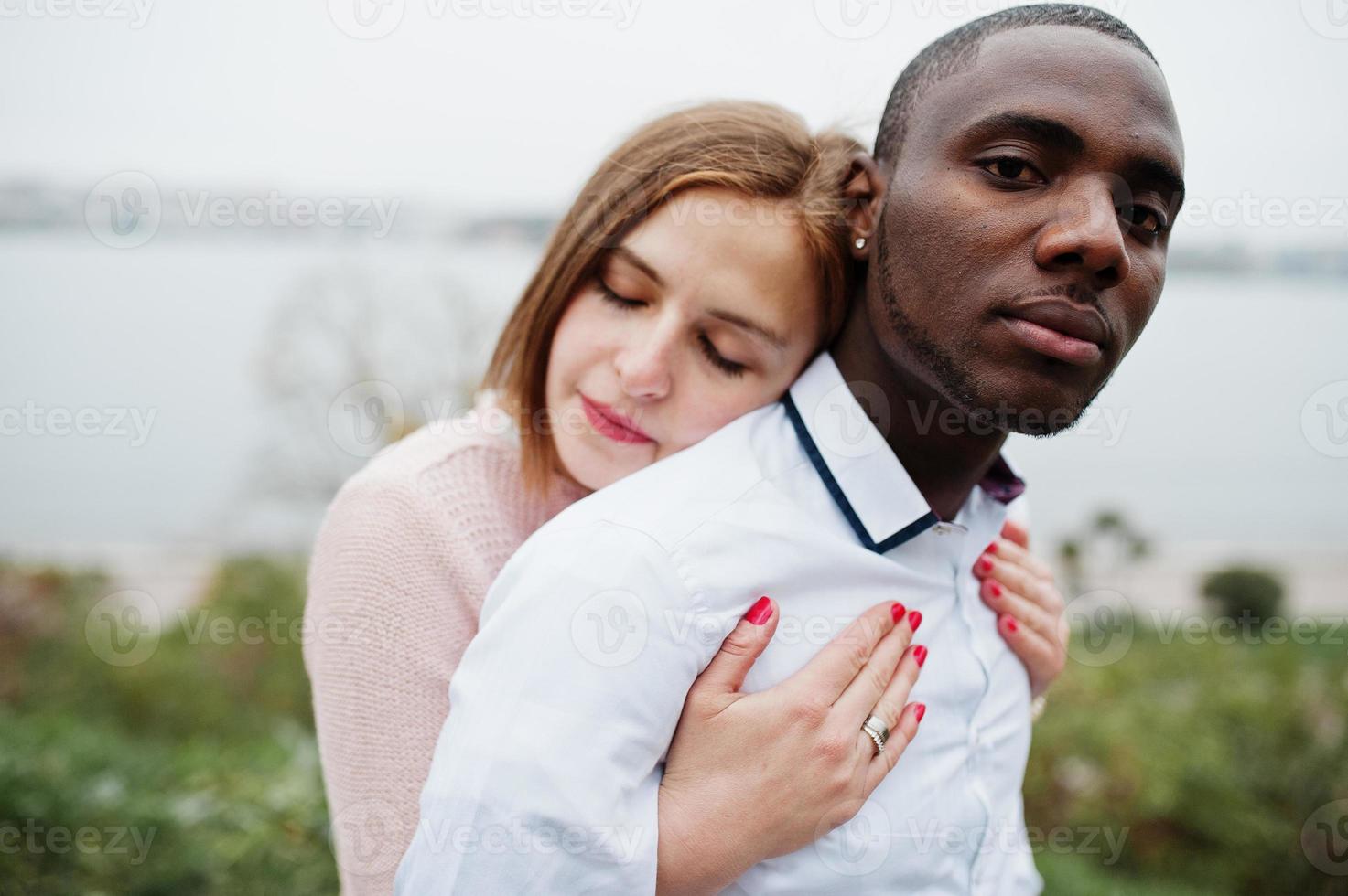 Happy multiethnic couple in love story. Relationships of african man and  white european woman. 10984511 Stock Photo at Vecteezy