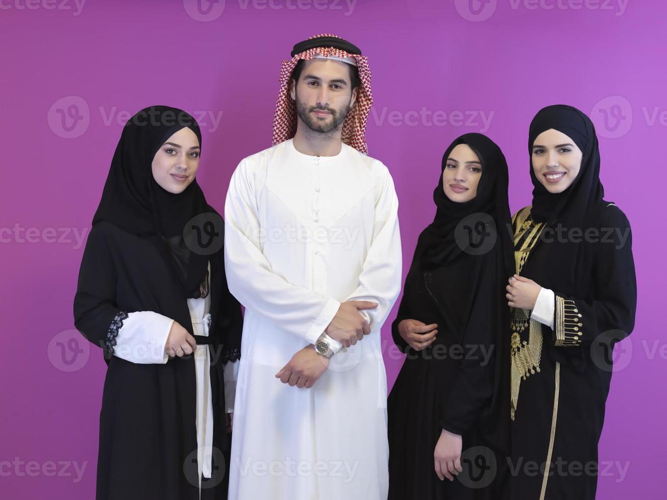 Portrait of young muslim people in traditional clothes photo