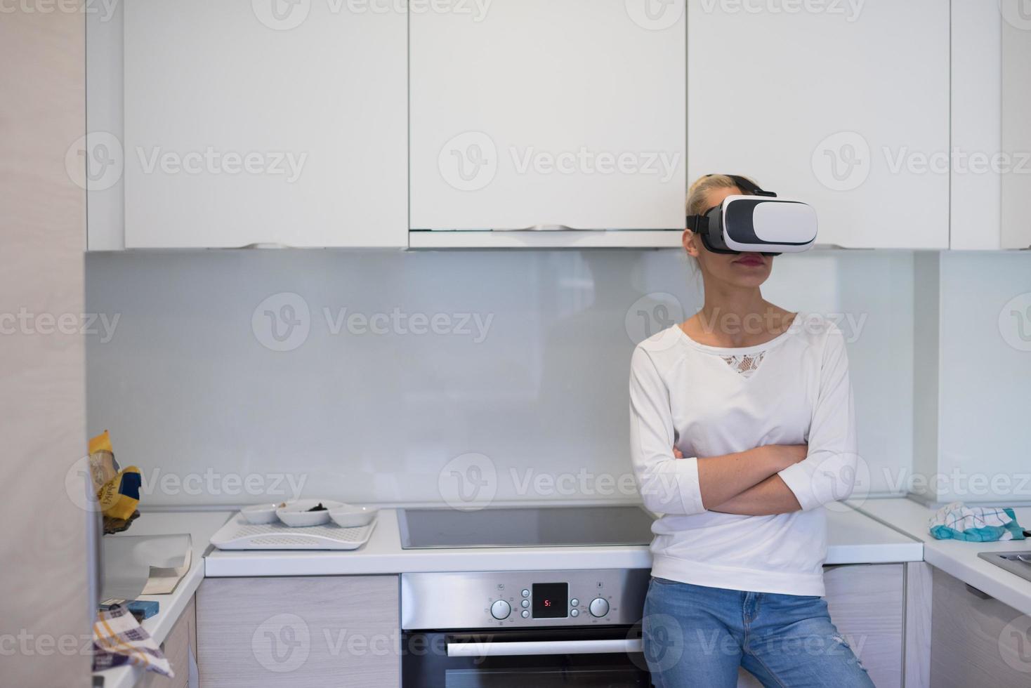 woman using VR-headset glasses of virtual reality photo