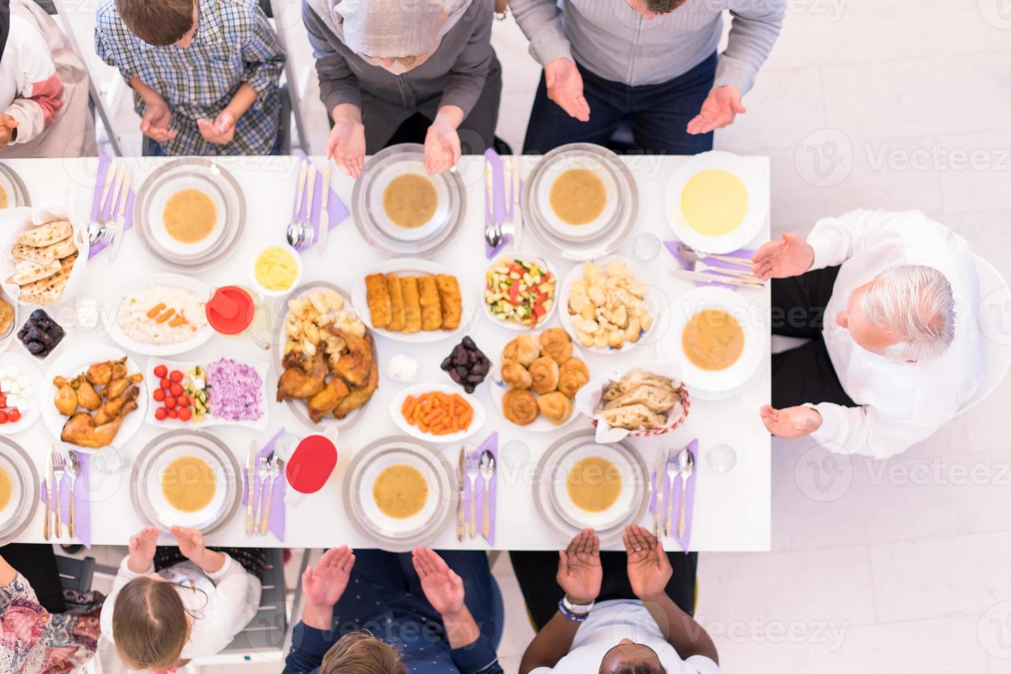 top view of modern muslim family having a Ramadan feast photo