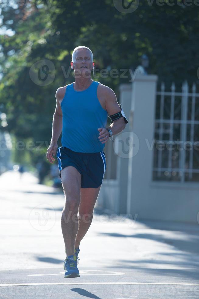 handsome senior man  jogging photo