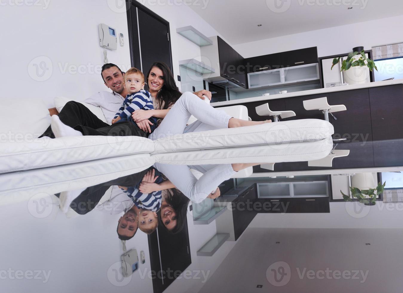 happy young family have fun  at home photo