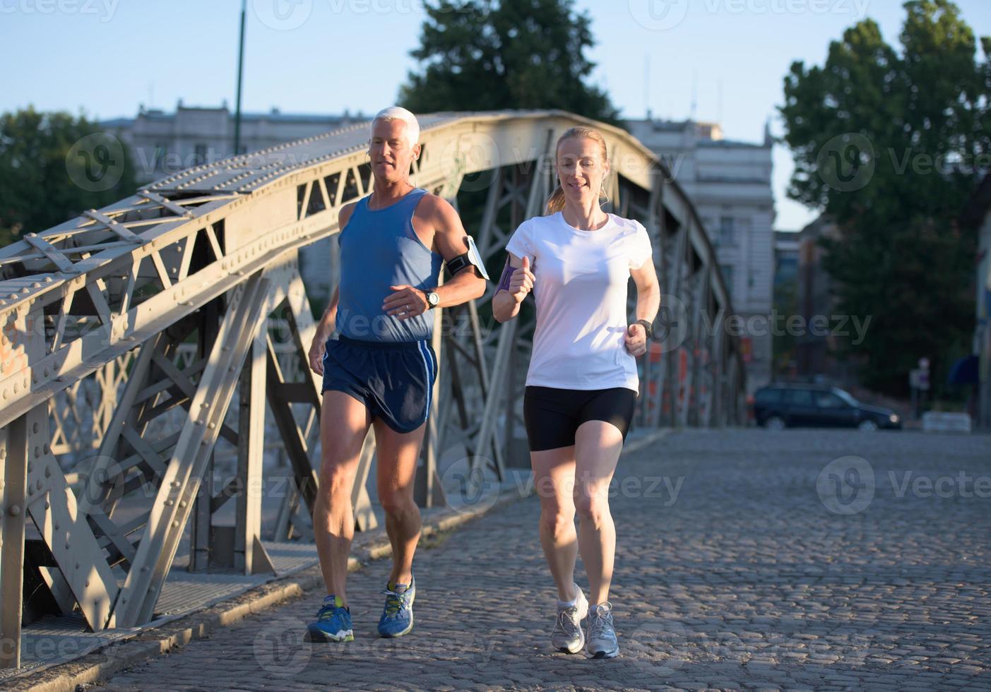 Couple jogging outside photo