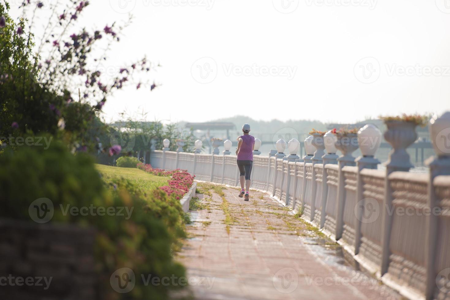 sporty woman jogging photo