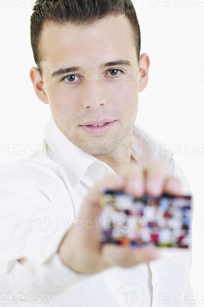 joven hombre de negocios con tarjeta vacía aislado en blanco foto