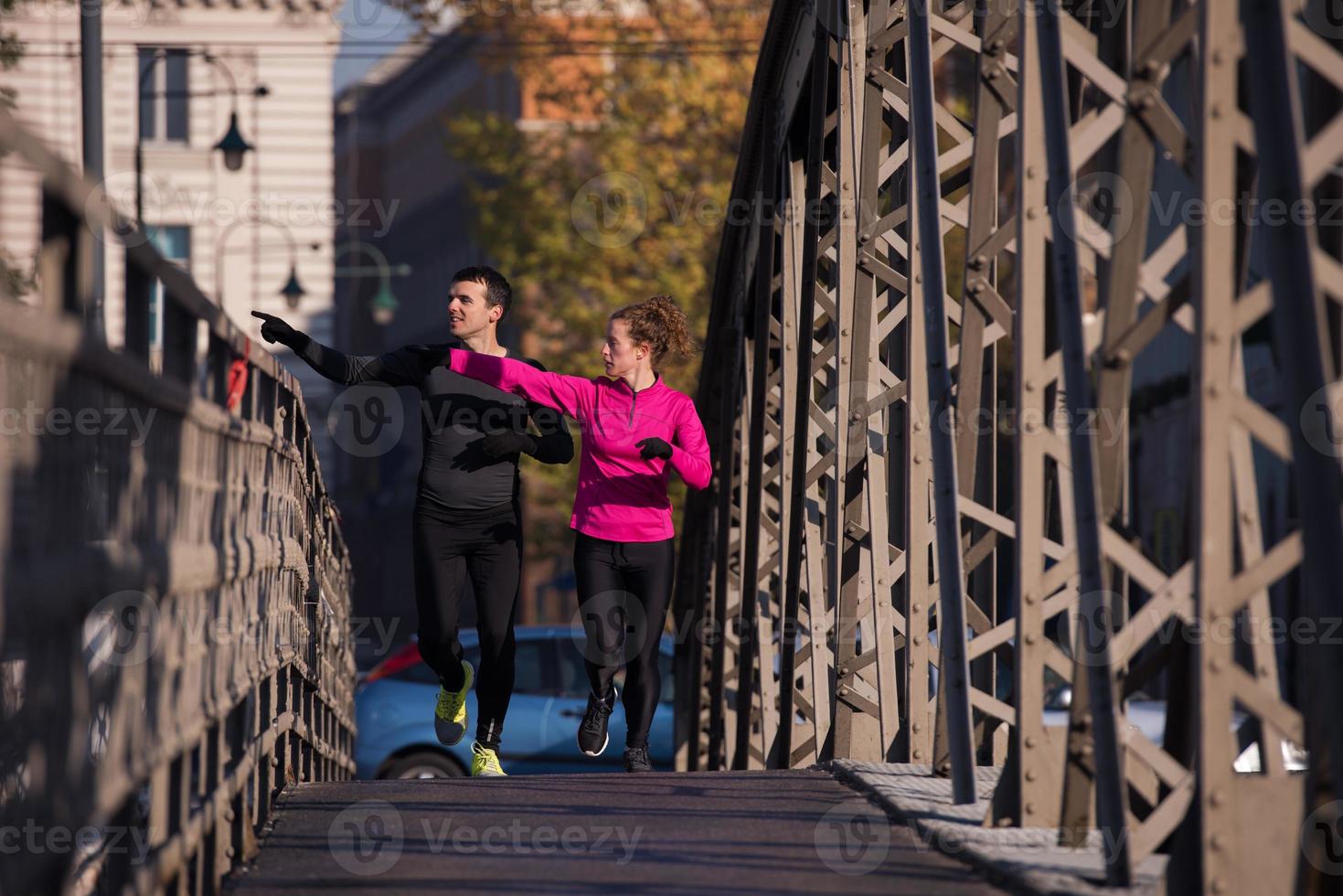 young  couple jogging photo