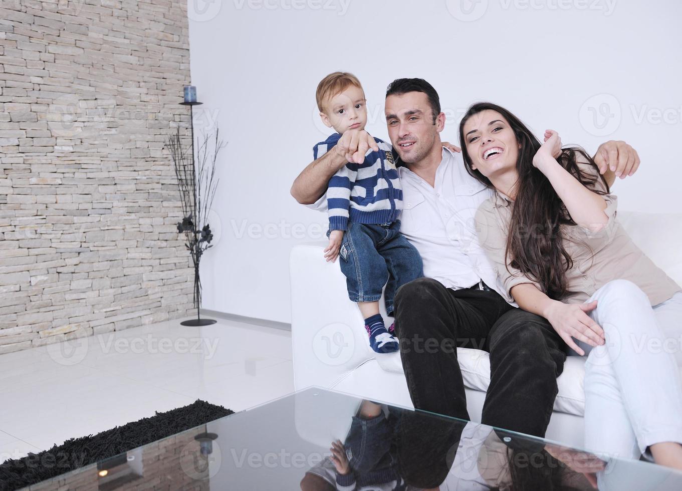 happy young family have fun  at home photo