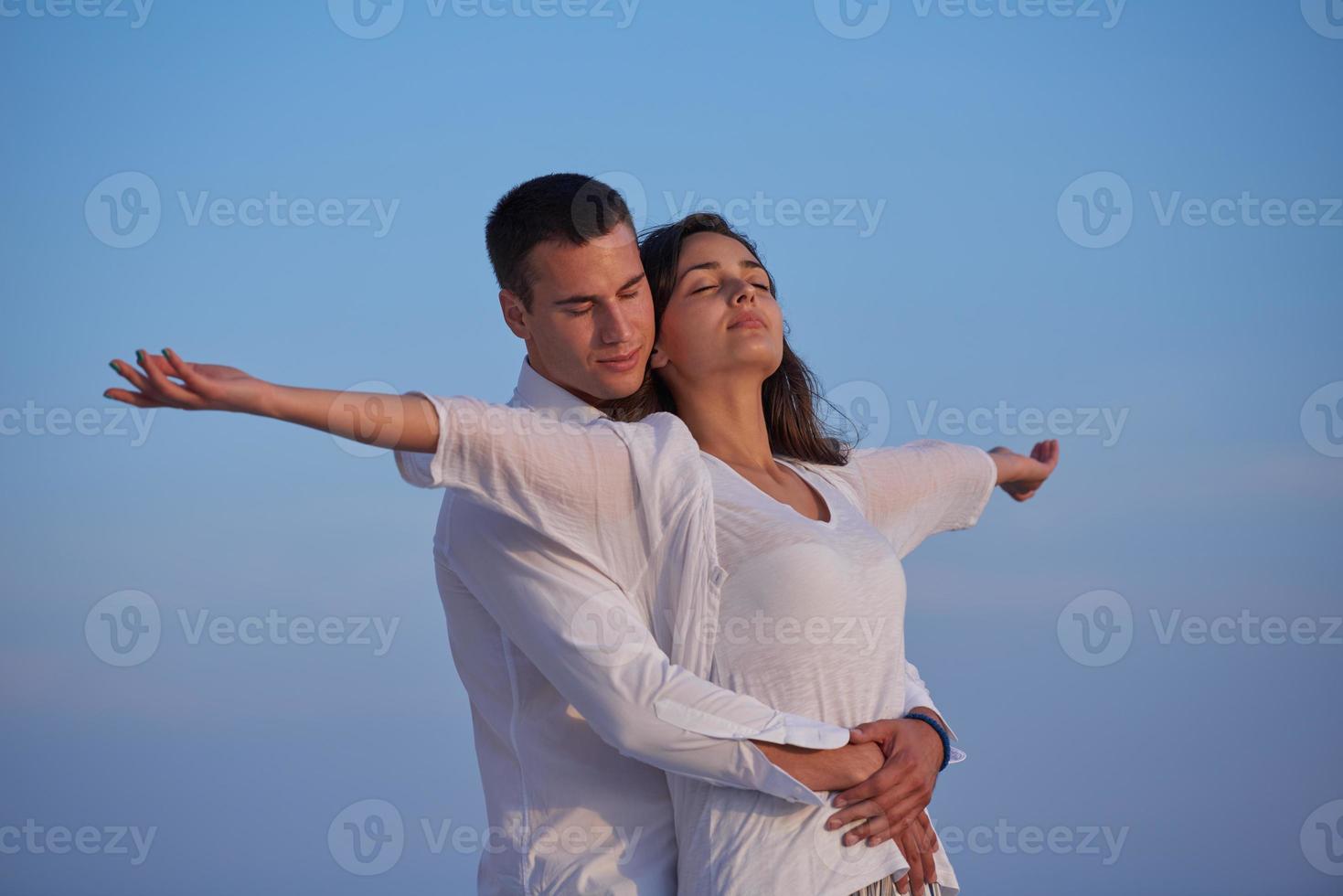 happy young romantic couple have fun arelax  relax at home photo
