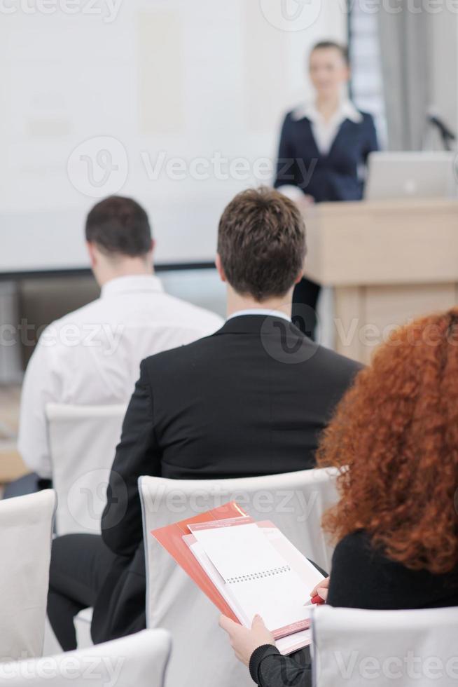 business woman giving presentation photo