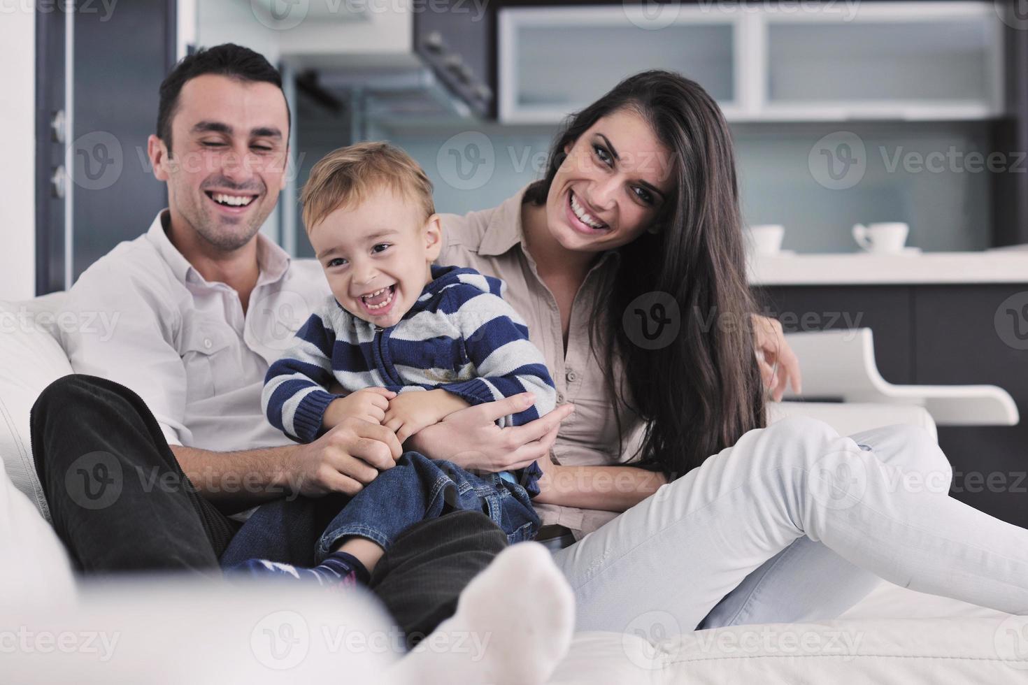 happy young family have fun  at home photo