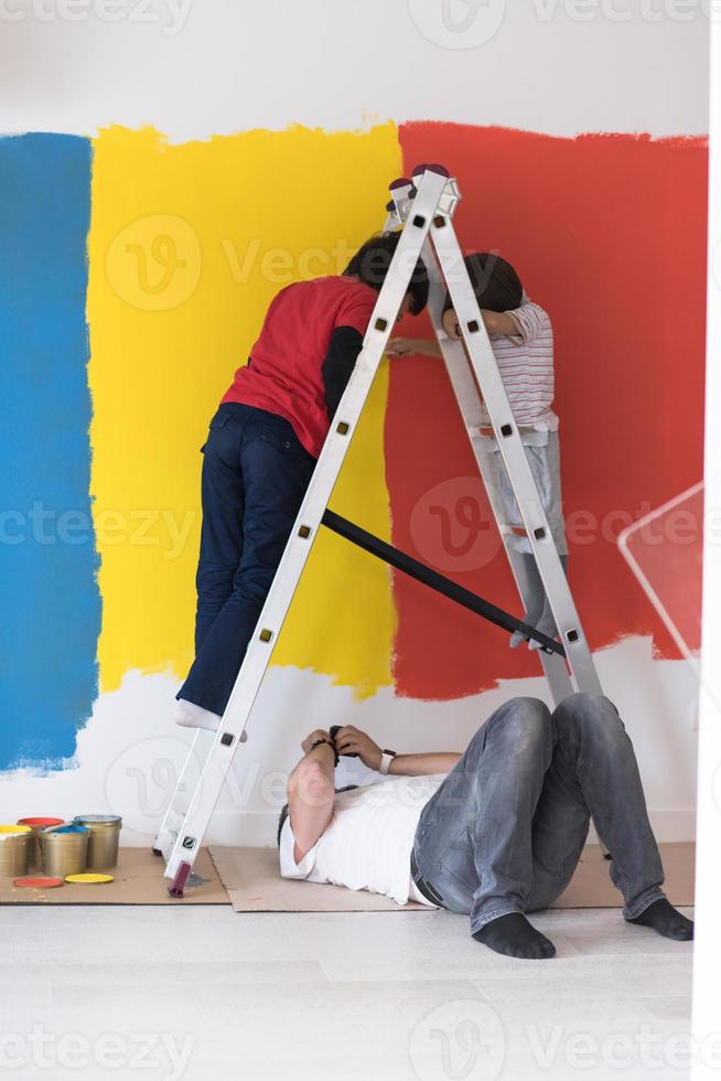 boys painting wall photo