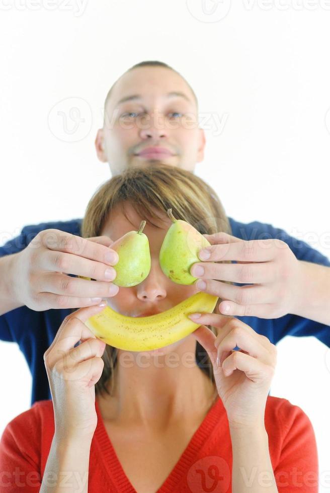 happy and healthy couple with fruits photo