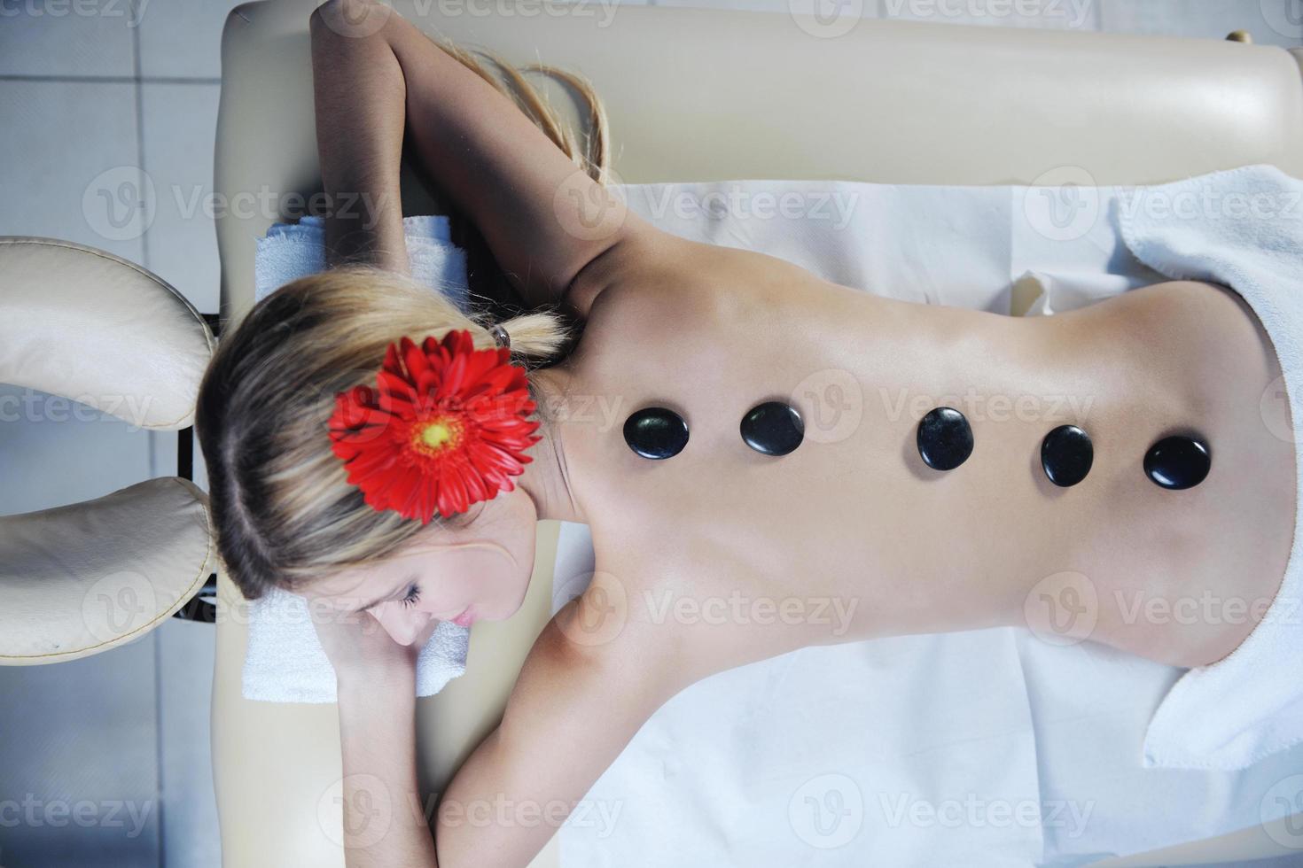 Beautiful young woman in spa photo