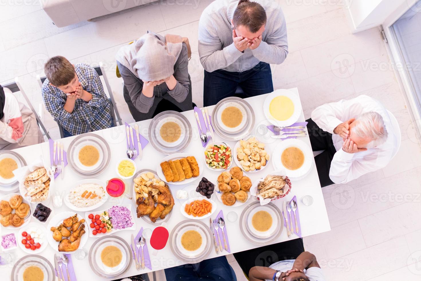 top view of modern muslim family having a Ramadan feast photo