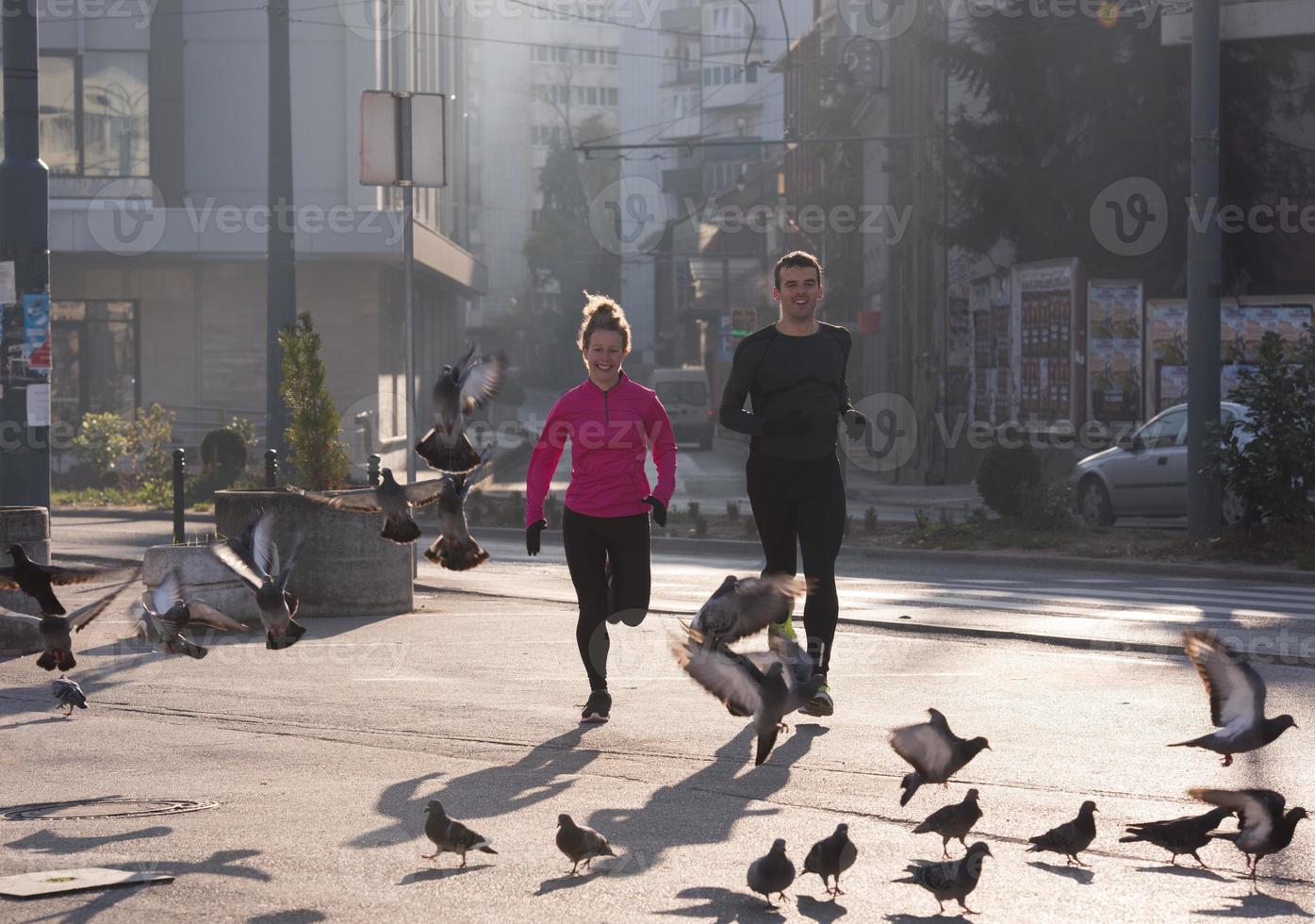 young  couple jogging photo